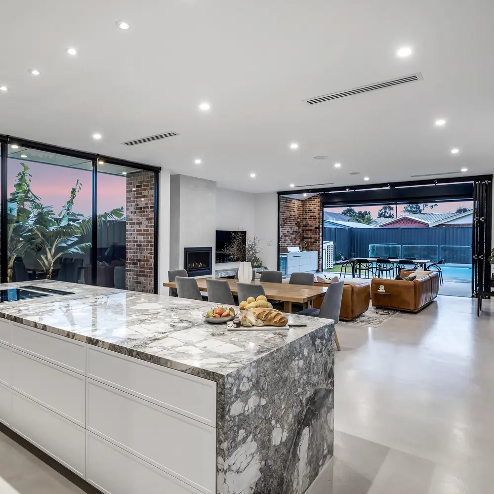 Inside a home with a kitchen and living area constructed by NDK constructions.